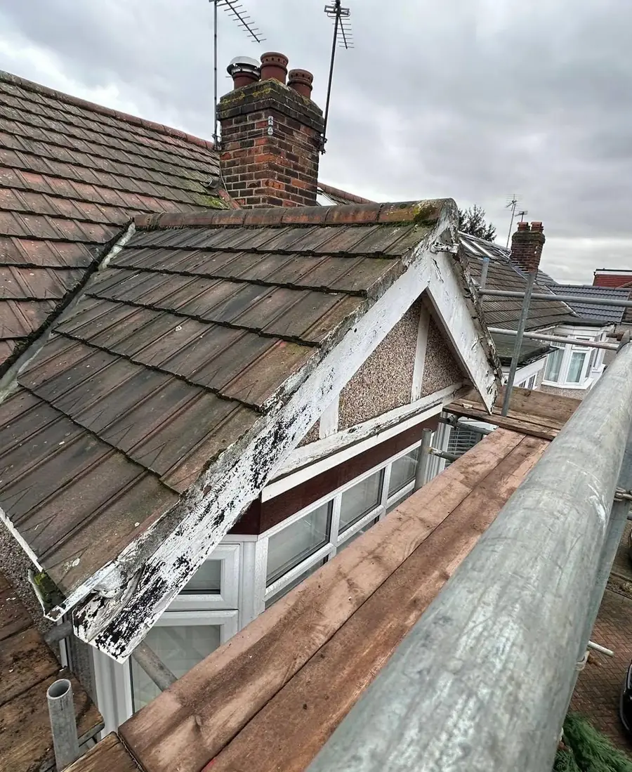 Dormer roof stripped back to the timbers before repair