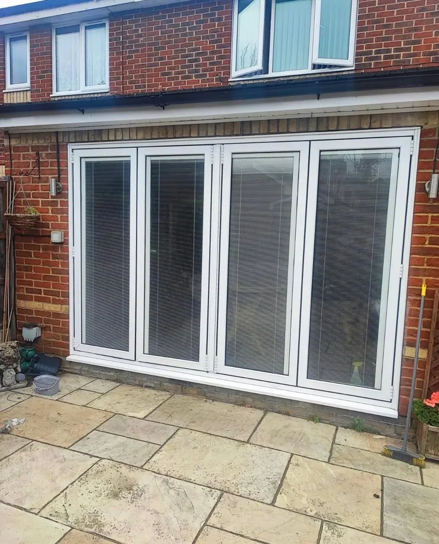 Rear extension with bi-fold doors under a new flat roof