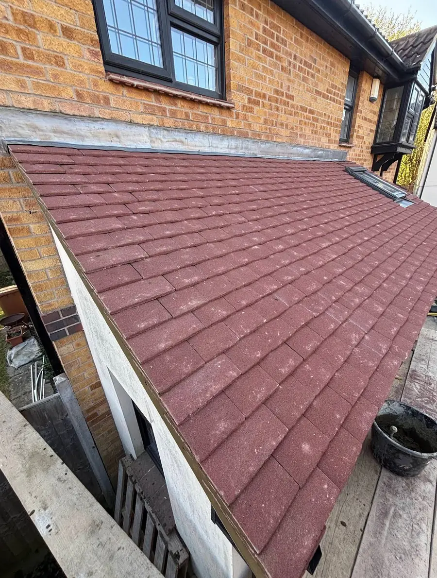 Brown plain tiled roof on a rear extension