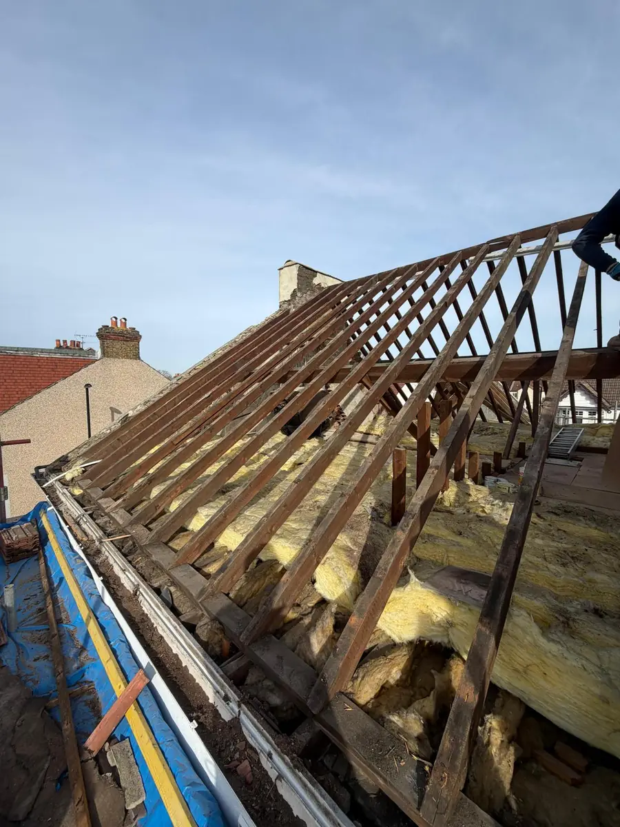 Timber rafters and purlins exposed during a re-roof